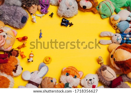 children's soft toys for developing games on a yellow background