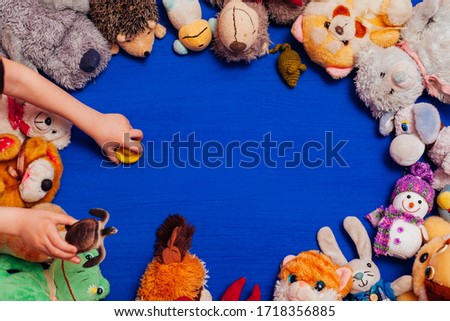 children's soft toys for developing games on a blue background