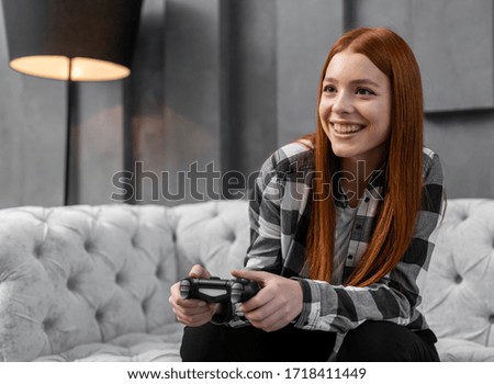 Modern female playing video games 