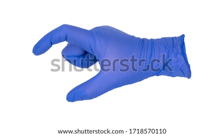 Hand wearing blue nitrile examination glove makes a long suture tail gesture.  Nonverbal hand signal for dermatological surgery