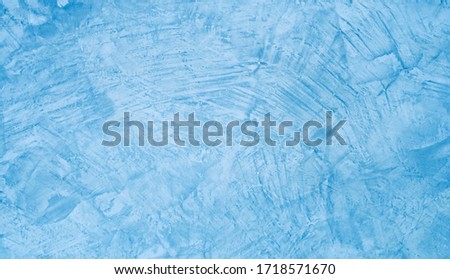 Abstract grunge background with blue cement wall.