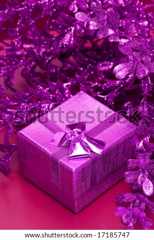 pink gift box with decoration leaves