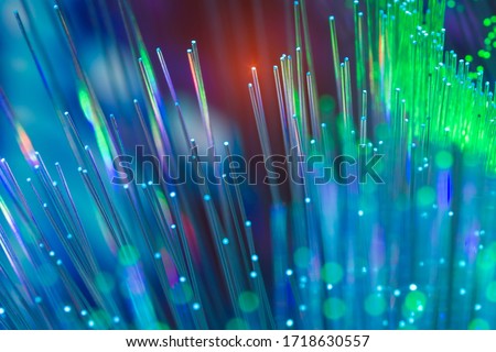 abstract background of fiber optic cables Royalty-Free Stock Photo #1718630557