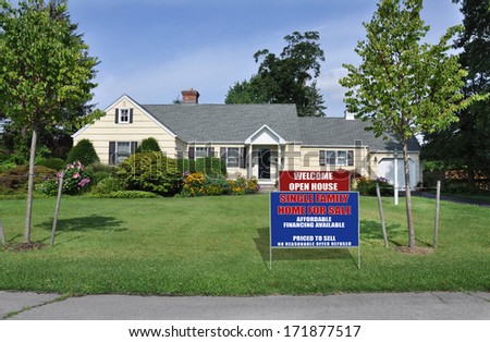 Real Estate Open House For Sale Sign suburban home landscaped yard sunny blue sky day residential neighborhood usa