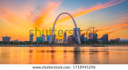 St. Louis, Missouri, USA downtown cityscape on the Mississippi River at twilight.  Royalty-Free Stock Photo #1718945296