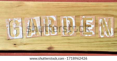 Garden sign on a deck board