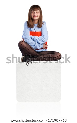 young woman hugging a book sitting on a banner on white background