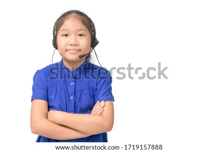 Cute asian girl is working as an operator at helpline talking with customer using headset, isolated on white background