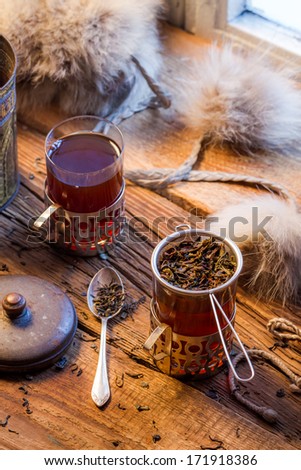 Warming tea served in old-fashioned
