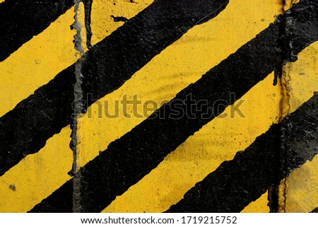 Industrial texture. Yellow and black stripes. Warning coloring.