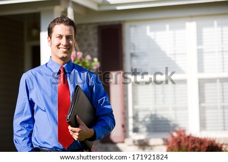 Real Estate: Agent Ready To Sell Home Royalty-Free Stock Photo #171921824