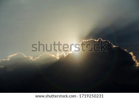 dark cloudy in the sky with bright light on background