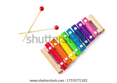 Rainbow Colored Wooden Toy 8 tone Xylophone glockenspiel isolated on white background with clipping path. toy glockenspiel made of metal and wood. Music, vibrant. Rhythm, listen. Copyspace Royalty-Free Stock Photo #1719271183