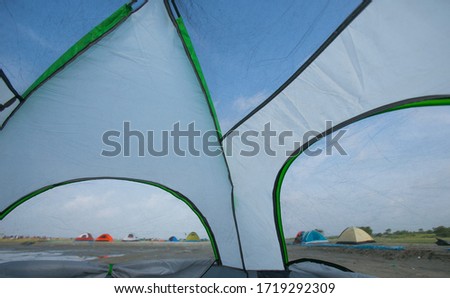 A camping ground photo, The view from another tent. 