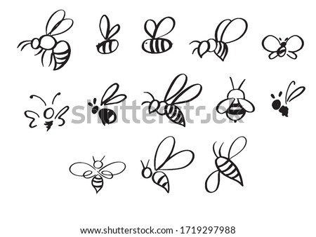 Selection of hand-drawn bees in different styles Royalty-Free Stock Photo #1719297988