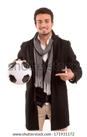 Studio picture of a handsome young football coach
