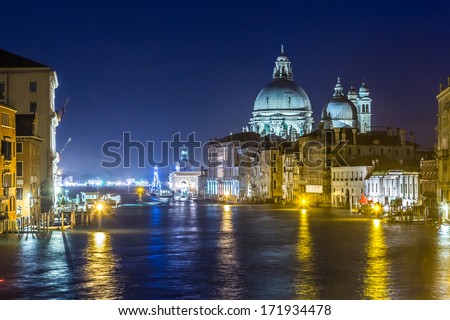 View of Basilica di Santa Maria della Salute at night under very dramatic sunset,Venice, Italy
