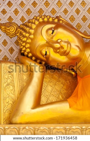 Image of reclining buddha with abstract background