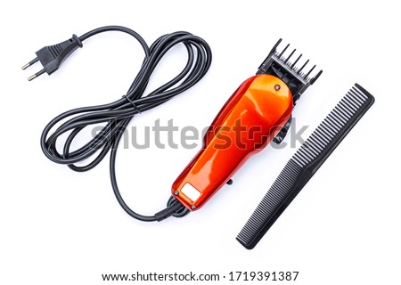 Hair clipper isolated on white background. Royalty-Free Stock Photo #1719391387
