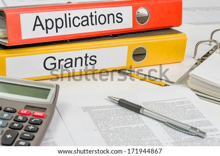 Folders with the label Applications and Grants Royalty-Free Stock Photo #171944867