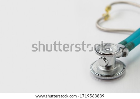 Closeup stethoscope is isolated on a white background with copy space for text. Health checkup. Physician tool for patient diagnosis. Cardiology doctor equipment. 