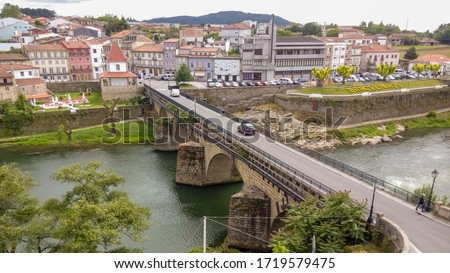 View of the Barcelos gothic bridge, over the Cávado river, in Barcelos, Portugal