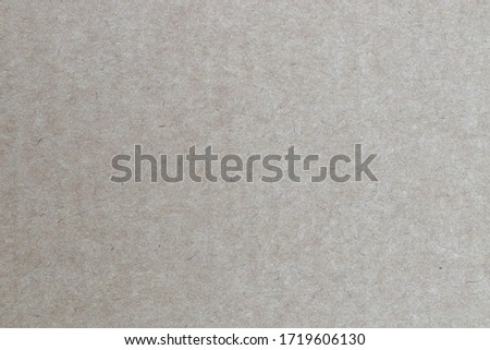Brown paper texture or cardboard surface close up detail from a paper box for packing. nature background concept 