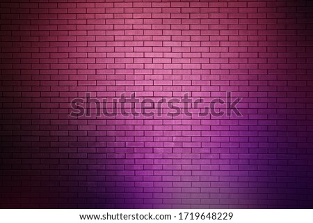Neon light on brick wall background and texture