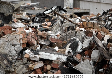 Ruins of a broken building, for photoshop. Grunge Wallpaper. Concrete industrial buildings collapsed. Dismantling an old building. Abandoned Industrial Buildings. House in ruins.Industrial background.