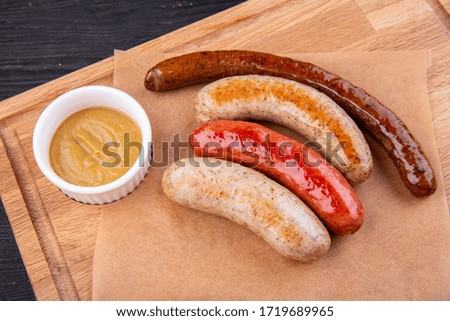 Sausage, sardels and flasks, served to beer with mustard