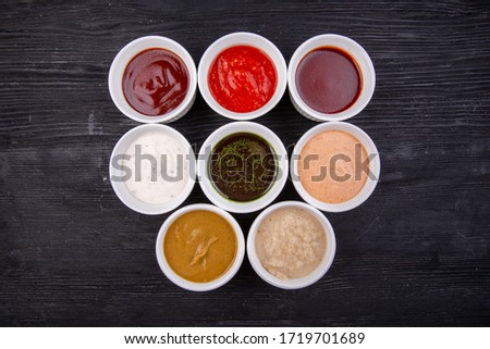 Sauces are collected, served with different dishes, fish, meat and garnish