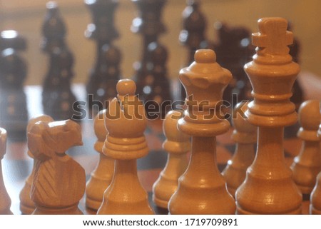 Chess pieces on board, selective focusing