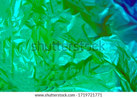 
glossy abstract bright background blue dark blue green tones, many shades of silver foil bright blue tones, blue green tones, many shades of painted silver foil