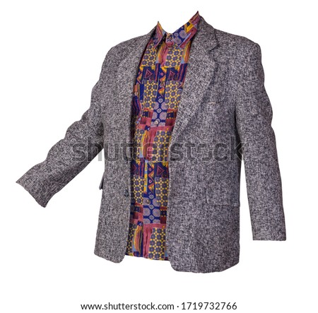 gray jacket with buttons and  multicolour t-shirt isolated on a white background. Casual style