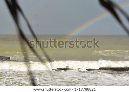Rainbow born in the sea 