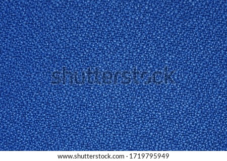 The texture and pattern of the fabric is used for the background.