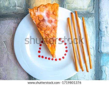 Slice of lemon pie on white plate