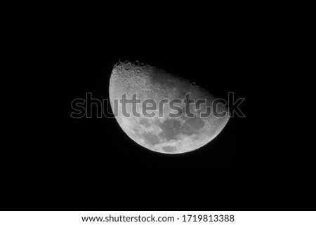 Half Moon

Photograph of the half moon in the dark sky