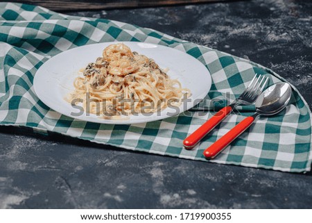 appetizing Italian pasta with seafood and king prawns, spaghetti with sauce