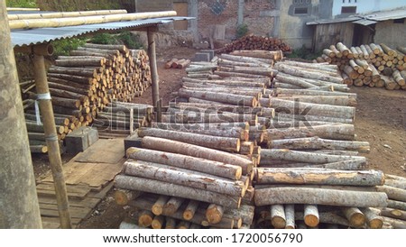 wood pile, wall firewood, wood is cut and arranged randomly