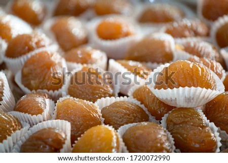tray of delicious marron glacé Royalty-Free Stock Photo #1720072990