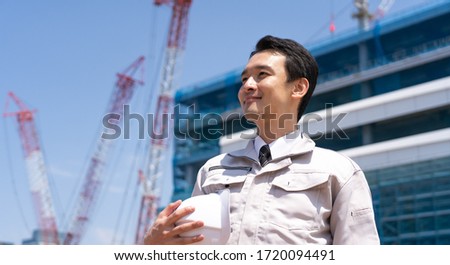 Businessman in architectural clothes portrait