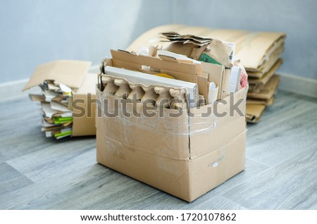 Recycling garbage. Recycling old paper products to be reused. ecology. Waste paper sorting Royalty-Free Stock Photo #1720107862