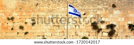 Israeli flag at the Western Wall, Jerusalem , Israel Royalty-Free Stock Photo #1720142017