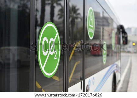 City electric bus. Selective focus on sign: without Carbon dioxide CO2