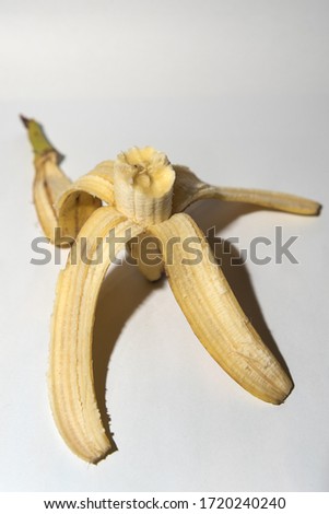 realistic picture of half eaten banana