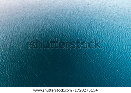 An evening aerial shot of the sparkling pure water