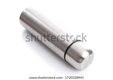 Steel metal travel thermos isolated on white background, close up