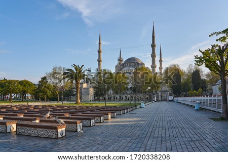 Spring in Sultanahmet Square. Sunset panorama of Sultanahmet Cami (Blue Mosque) and empty benches, Istanbul, Turkey.  Royalty-Free Stock Photo #1720338208