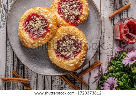 Delicious cakes with currants, poppy seeds and curd